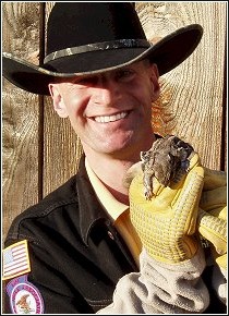 ned bruha holding flying squirrel removed during the exclusion process